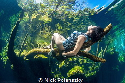 Kicking back in Cenote Jardin Del Eden by Nick Polanszky 